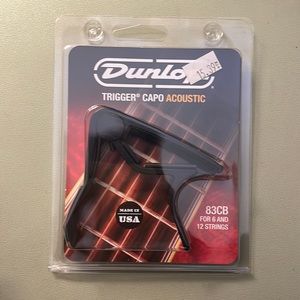 Dunlop Capo curved black new in box